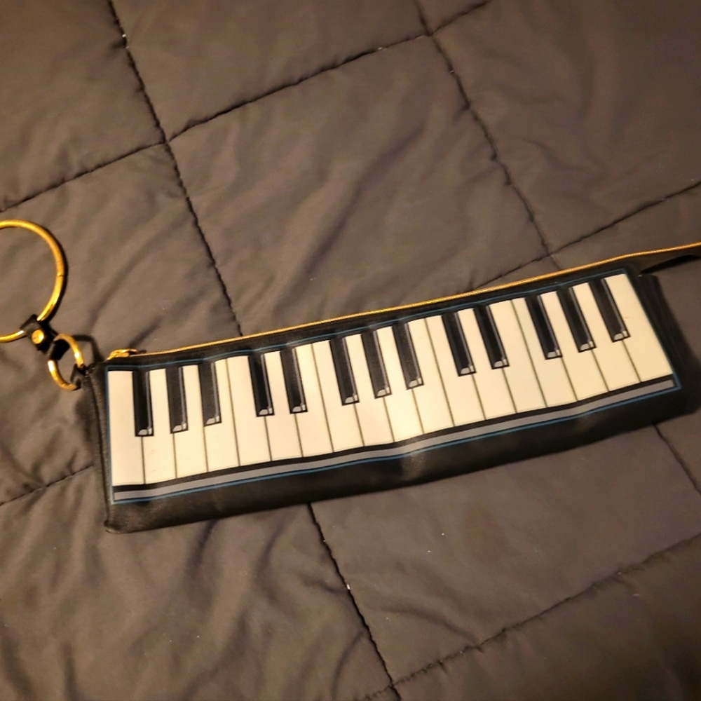 Keyboard clutch bag